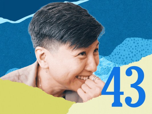 Smiling person with modern hairstyle against a colorful abstract background, number 43 prominently displayed.