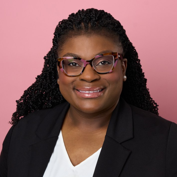 Portrait of Ebony Wilkinson.